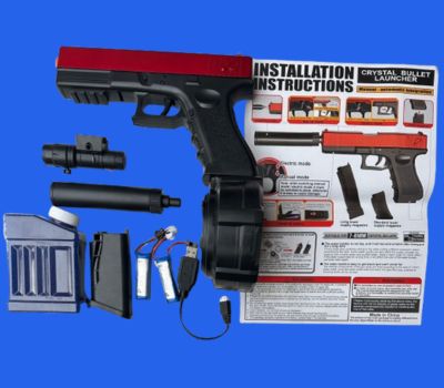 A gel blaster is presented alongside its instructions and various accessories for proper usage.